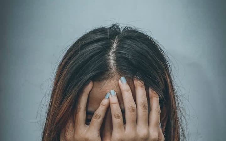 Mulher desapontada (Dev Asangbam)